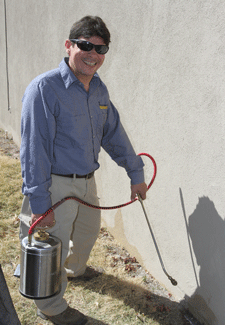 Spraying for pests outside in Las Cruces