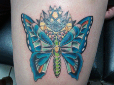 Butterfly tattoo done at DNA Ink Tattoo & Body Piercing Shop in Las Cruces