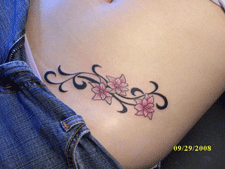 Flower tattoo at DNA Ink Tattoo & Body Piercing Shop in Las Cruces