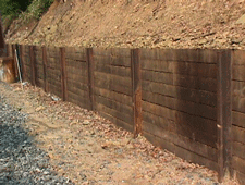 Wood retaining wall by Hedgehogs in Las Cruces