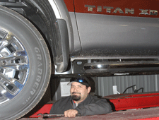 Working on a Titan truck in Las Cruces at Nissan of Las Cruces