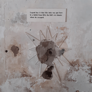 Bullet hole shot by Billy the Kid in Lincoln, NM