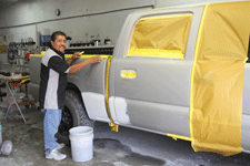 Prepping a car for painting at ABC Paint & Body Shop in Las Cruces, NM