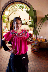 Serving drinks at La Posta de Mesilla