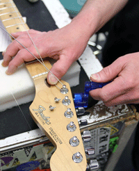 Guitar stringing in Las Cruces