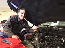 Working on a diesel truck at Raven Diesel Performance in Las Cruces