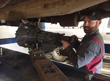 Working on a diesel transmission in Las Cruces