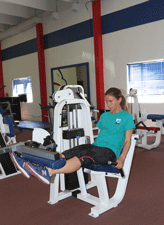 Lady working out at The Gym in Las Cruces