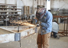 Welding trailers at  Mesilla Park Fabrication